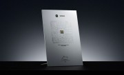 雷军展示玄戒O1创始纪念品：芯片本体+设计图 网友强烈建议上架 !
